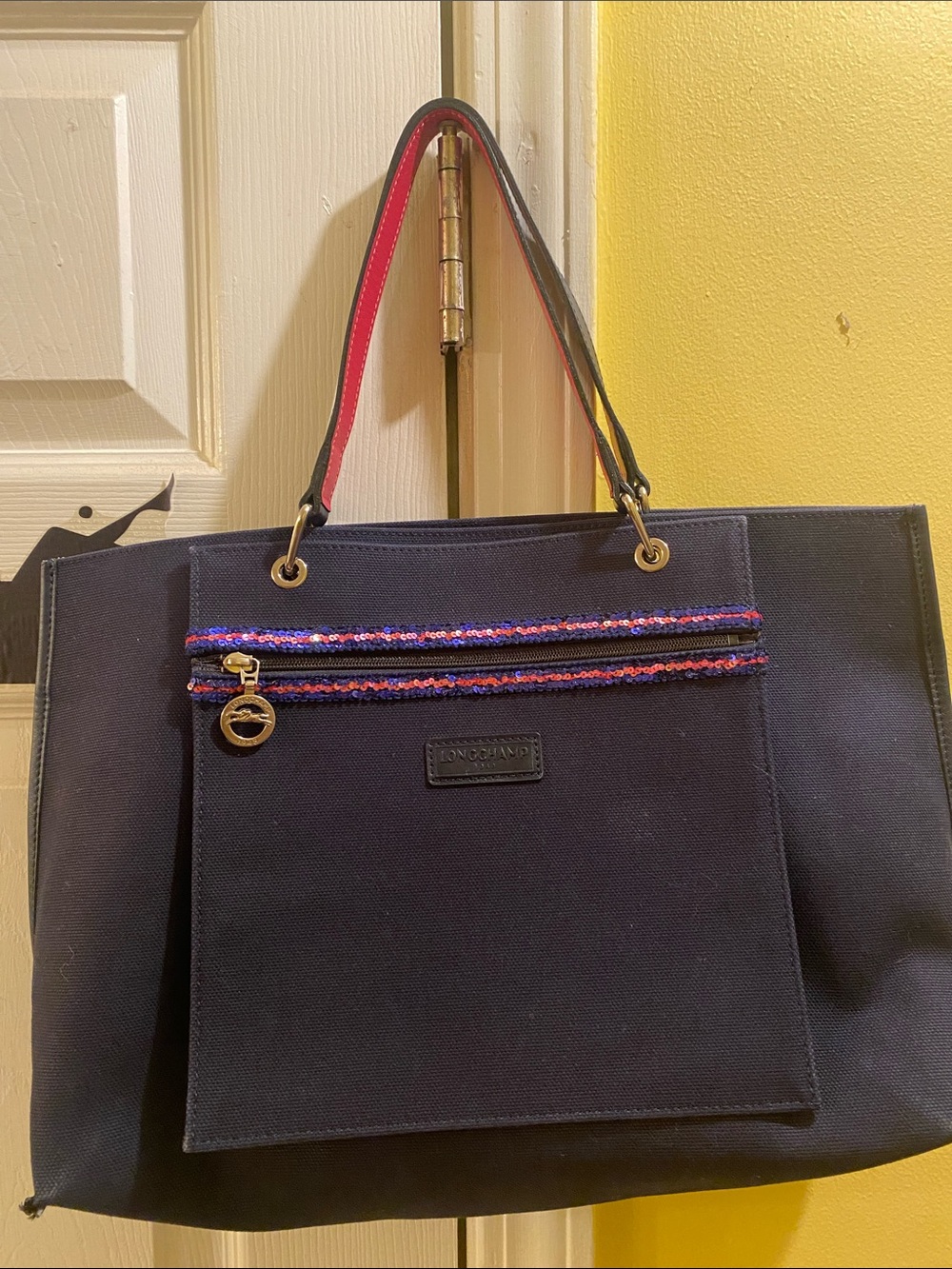 Longchamp Navy Canvas Tote with Pink-Trim Handles and Multicolor Zip Detail